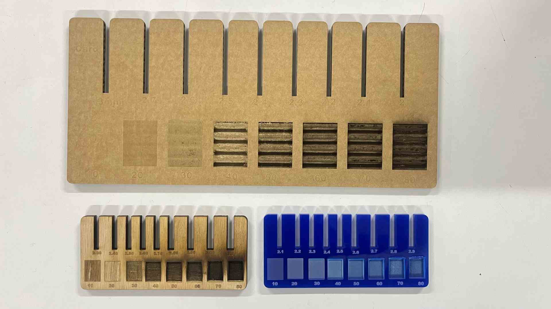 Kerf comb test pieces for cardboard, wood, and acrylic